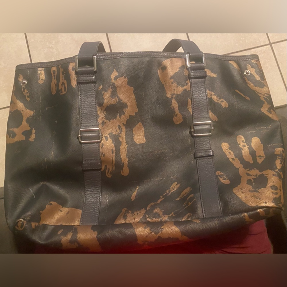 Roomy gently loved L.A.M.B. Bag, has 2 inside lining tears-see pix